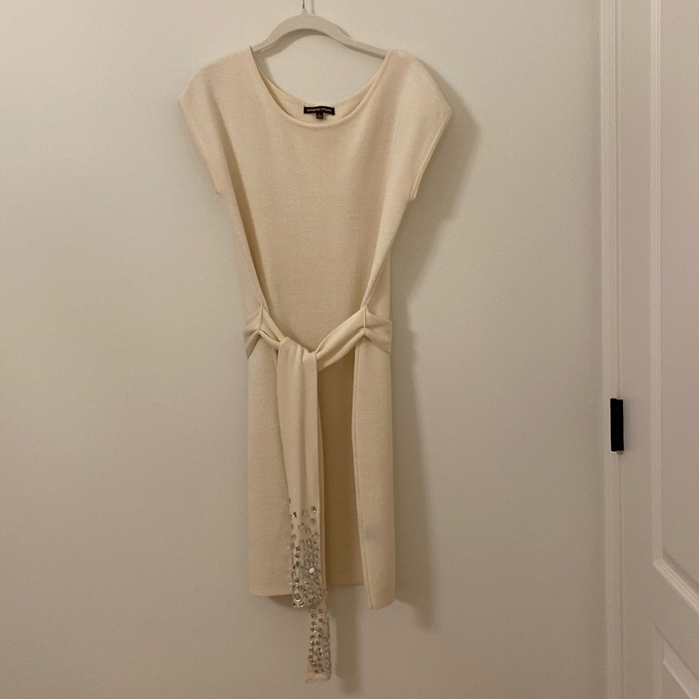 Beautiful cream dress with jewel embellished belt.